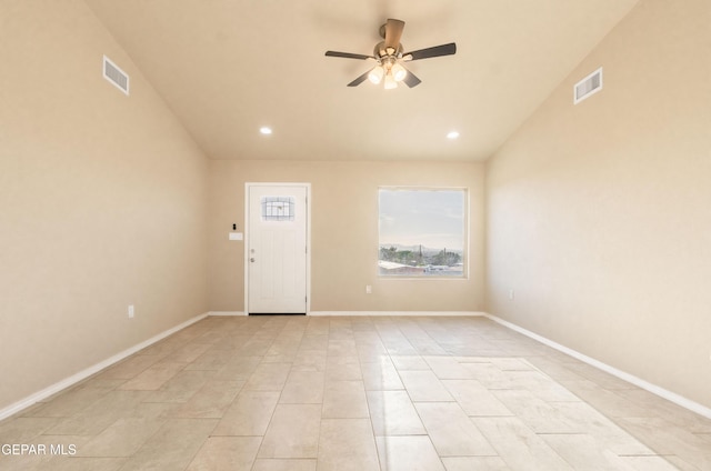 empty room featuring ceiling fan, vaulted ceiling, recessed lighting, and baseboards