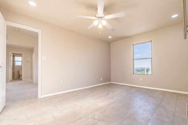 spare room featuring a ceiling fan, recessed lighting, and baseboards