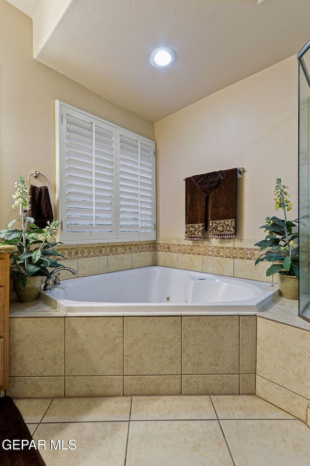 6225 Via Serena Dr, El Paso, TX 79912 - bathroom with tile patterned floors and a jetted tub