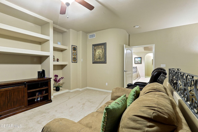 6225 Via Serena Dr, El Paso, TX 79912 - living room with light colored carpet, a ceiling fan, built in features, and baseboards