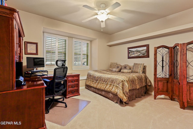6225 Via Serena Dr, El Paso, TX 79912 - bedroom with carpet floors, a desk, ceiling fan, and baseboards