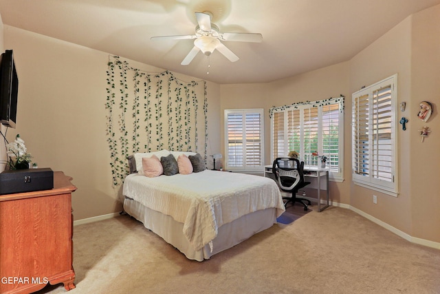 6225 Via Serena Dr, El Paso, TX 79912 - bedroom with light carpet, baseboards, and a ceiling fan