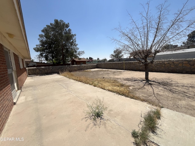 8734 Plains Dr, El Paso, TX 79907 - view of yard featuring a patio and fence