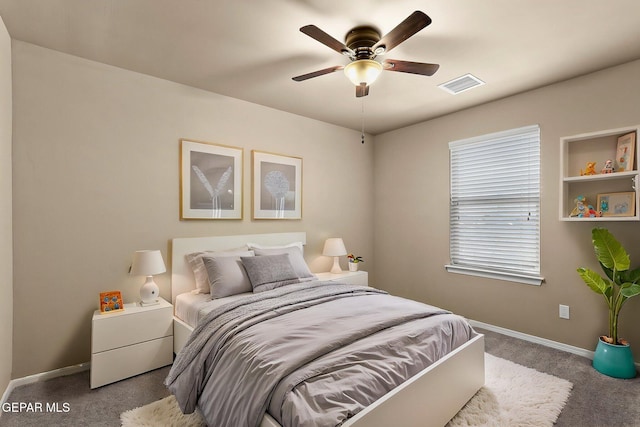 7541 Wolf Creek Dr, El Paso, TX 79911 - carpeted bedroom with baseboards and ceiling fan
