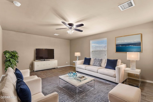 7541 Wolf Creek Dr, El Paso, TX 79911 - living room with wood finished floors, baseboards, and ceiling fan