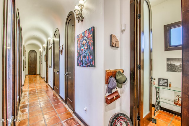 corridor featuring light tile patterned floors