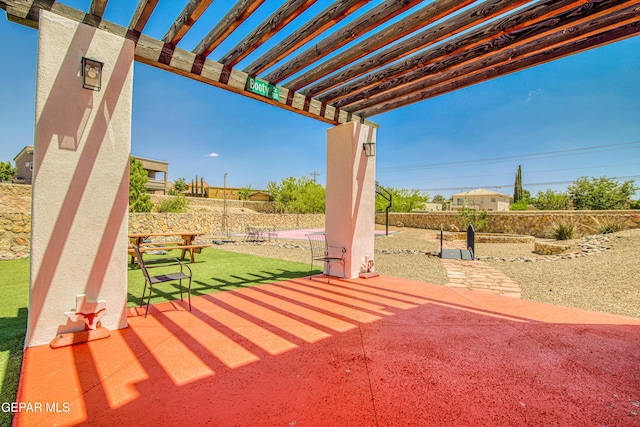 view of patio with a pergola and a fenced backyard