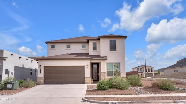 13868 Sky Ranger Ave, El Paso, TX 79928 - view of front of house with concrete driveway, stone siding, stucco siding, and a garage