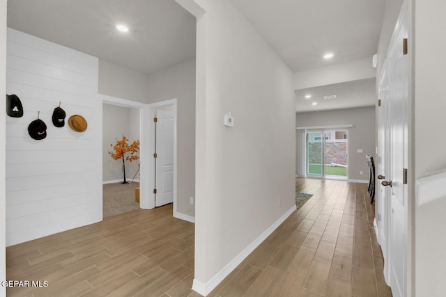 13868 Sky Ranger Ave, El Paso, TX 79928 - hallway featuring light wood finished floors, recessed lighting, and baseboards