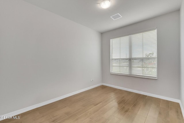 13868 Sky Ranger Ave, El Paso, TX 79928 - spare room with baseboards and light wood-style floors