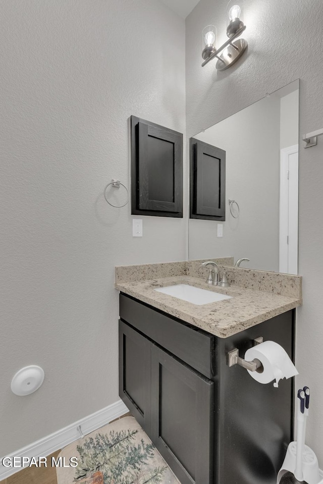 13868 Sky Ranger Ave, El Paso, TX 79928 - bathroom with vanity and baseboards