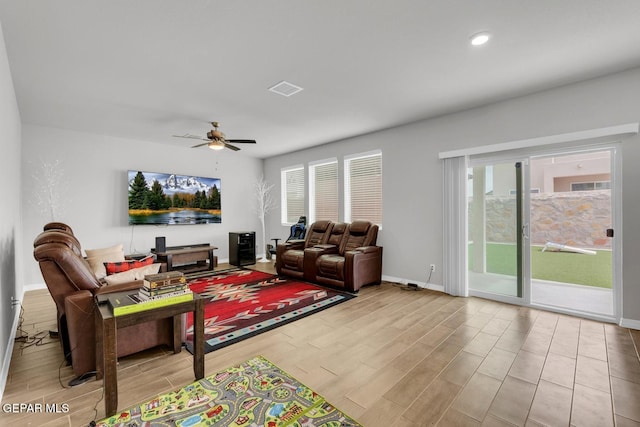 13868 Sky Ranger Ave, El Paso, TX 79928 - living area featuring wood finish floors, a ceiling fan, healthy amount of natural light, baseboards, and recessed lighting