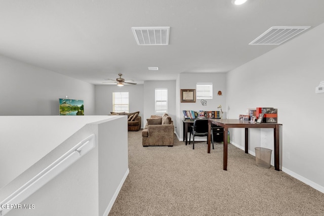 13868 Sky Ranger Ave, El Paso, TX 79928 - office area featuring light colored carpet, ceiling fan, and baseboards