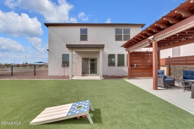 13868 Sky Ranger Ave, El Paso, TX 79928 - rear view of property with stucco siding and a patio