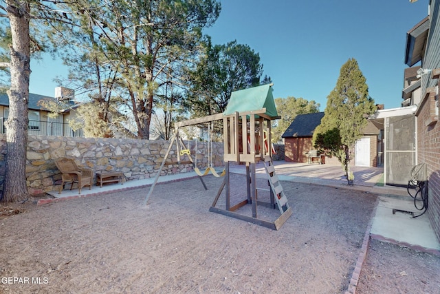 1759 Green Gate Way, El Paso, TX 79936 - view of patio featuring a playground and fence
