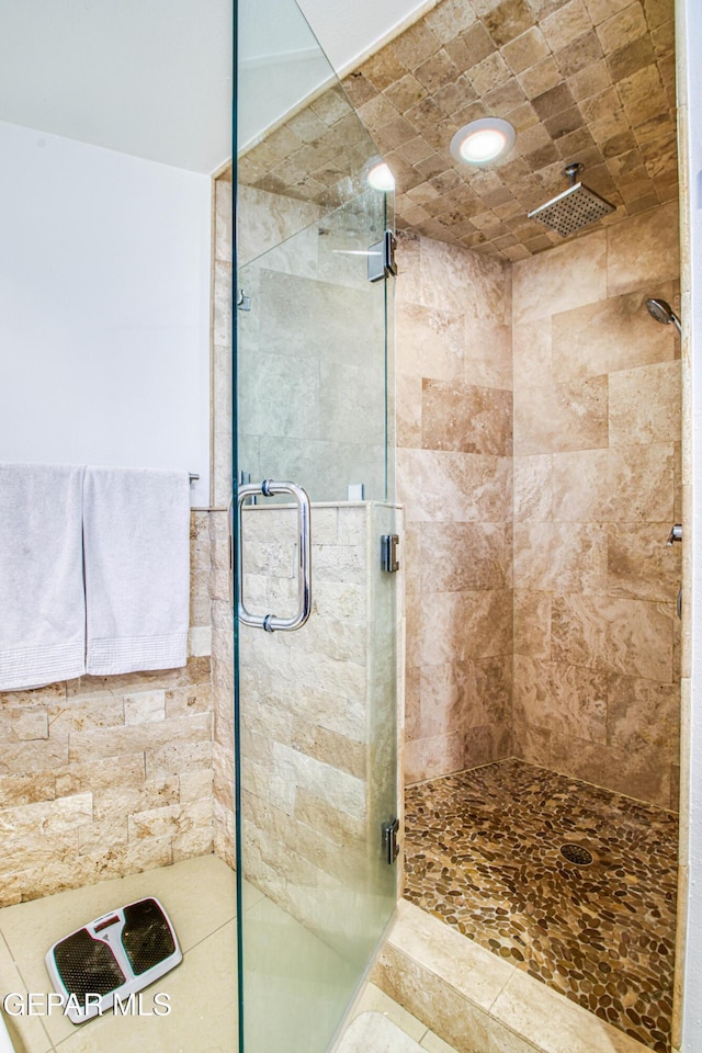 bathroom with a stall shower