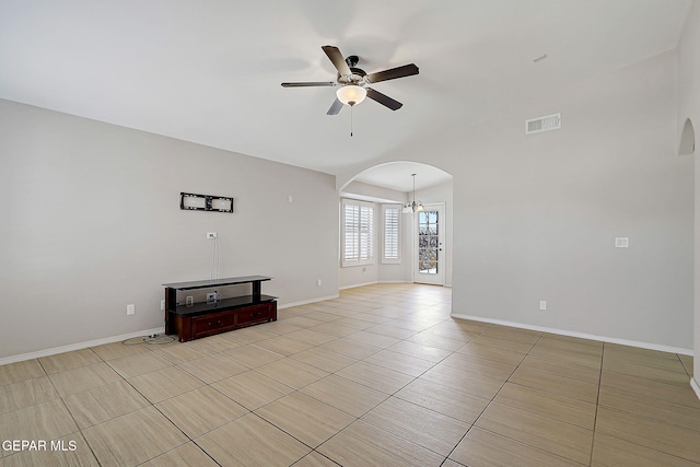 14182 John Scagno, El Paso, TX 79938 - unfurnished living room with ceiling fan with notable chandelier, visible vents, arched walkways, light tile patterned floors, and baseboards