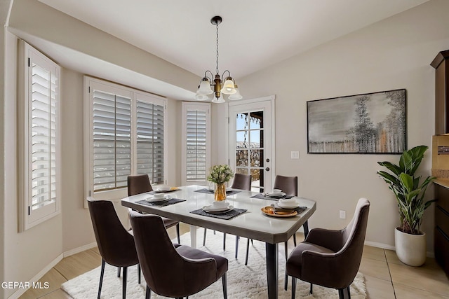 14182 John Scagno, El Paso, TX 79938 - dining room featuring baseboards and a chandelier