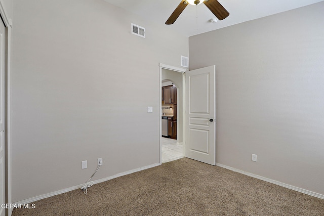14182 John Scagno, El Paso, TX 79938 - spare room with arched walkways, ceiling fan, visible vents, and light colored carpet