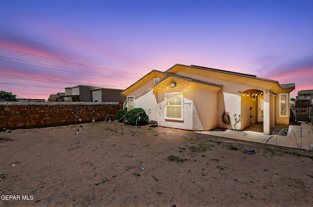 14182 John Scagno, El Paso, TX 79938 - view of front of house with fence and stucco siding