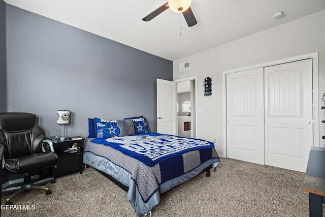carpeted bedroom with a closet and a ceiling fan