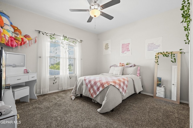 bedroom with carpet, ceiling fan, and baseboards