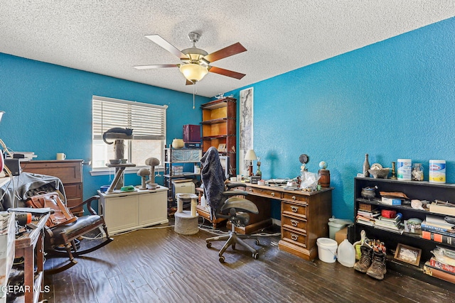 home office with a textured wall, a textured ceiling, ceiling fan, and wood finished floors