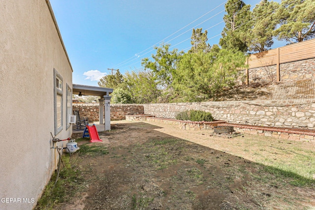 view of yard featuring a patio area and a fenced backyard