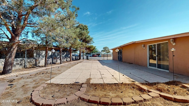 view of patio / terrace with fence