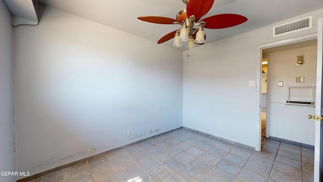 spare room featuring ceiling fan