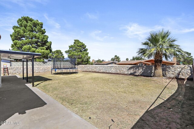 view of yard featuring a trampoline