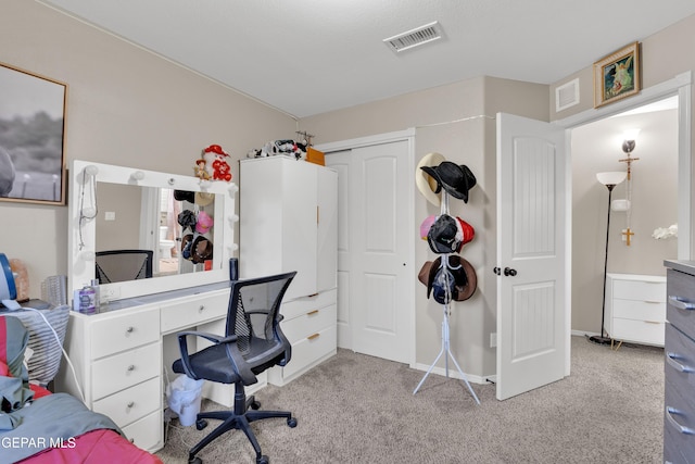 home office with light colored carpet