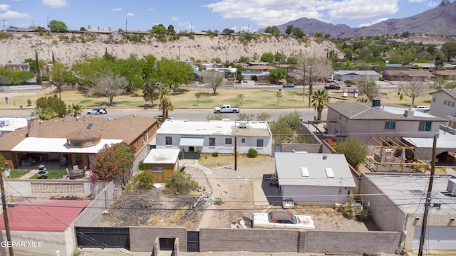 aerial perspective of suburban area featuring a mountain backdrop