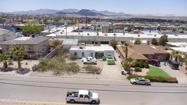 aerial perspective of suburban area with a mountain backdrop