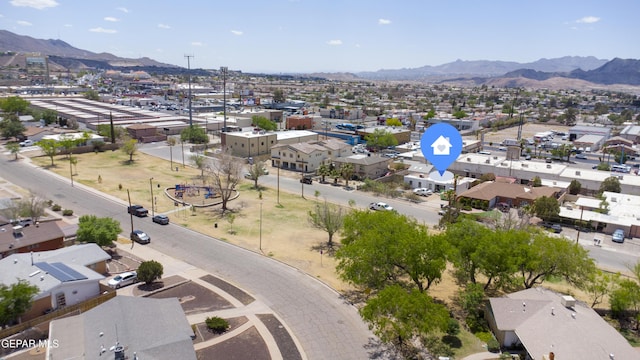 aerial perspective of suburban area featuring a mountainous background