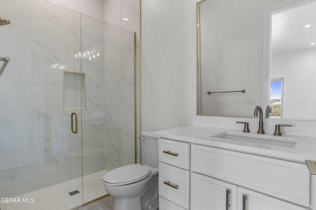 820 Acton St, Horizon City, TX 79928 - bathroom featuring a marble finish shower, toilet, vanity, and recessed lighting