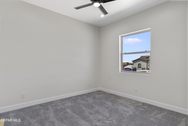 820 Acton St, Horizon City, TX 79928 - empty room with dark colored carpet, baseboards, and ceiling fan