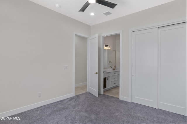820 Acton St, Horizon City, TX 79928 - unfurnished bedroom with carpet flooring, ensuite bathroom, a closet, baseboards, and ceiling fan