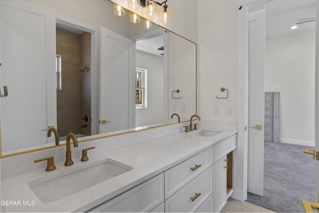 820 Acton St, Horizon City, TX 79928 - full bath with double vanity, a shower, and baseboards