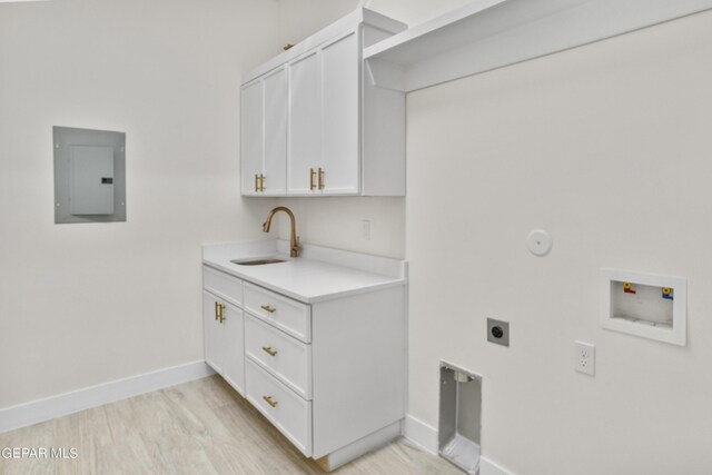 820 Acton St, Horizon City, TX 79928 - clothes washing area featuring electric panel, hookup for an electric dryer, washer hookup, and baseboards