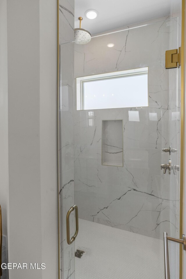 820 Acton St, Horizon City, TX 79928 - bathroom featuring a marble finish shower
