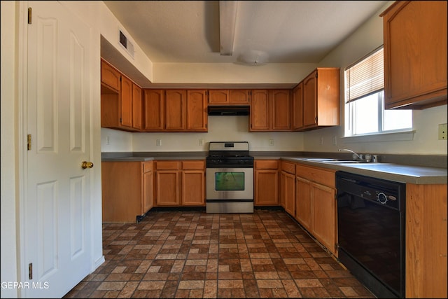 6205 Alina Baltazar Dr, El Paso, TX 79932 - kitchen with stainless steel range with gas cooktop, black dishwasher, under cabinet range hood, brick patterned flooring, and brown cabinetry