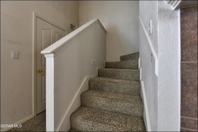 6205 Alina Baltazar Dr, El Paso, TX 79932 - staircase with carpet floors
