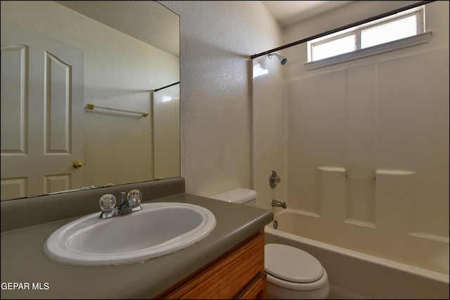 6205 Alina Baltazar Dr, El Paso, TX 79932 - full bath with vanity, bathing tub / shower combination, and a textured wall