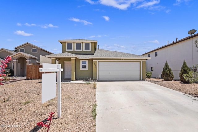 view of front facade featuring a garage, driveway, a shingled roof, stucco siding, and fence