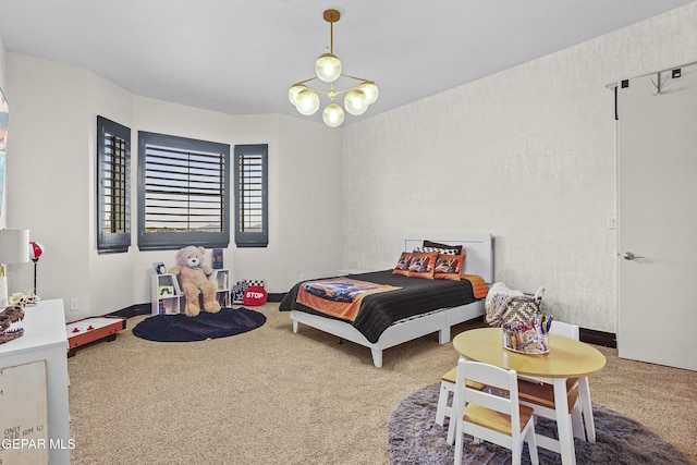 5905 Ojo De Agua Dr, El Paso, TX 79912 - carpeted bedroom featuring a chandelier and baseboards