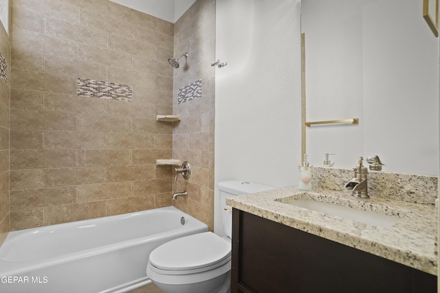 5905 Ojo De Agua Dr, El Paso, TX 79912 - bathroom featuring toilet, bathing tub / shower combination, and vanity