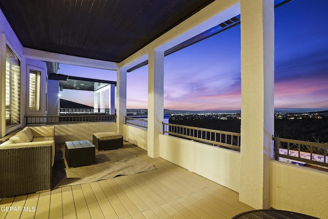 5905 Ojo De Agua Dr, El Paso, TX 79912 - balcony at dusk with a water view