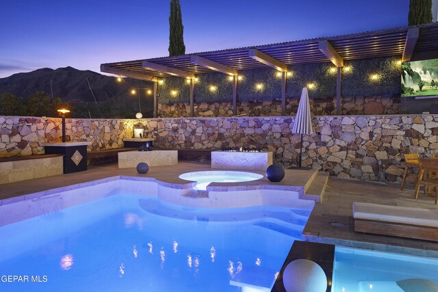 5905 Ojo De Agua Dr, El Paso, TX 79912 - view of pool featuring a mountain view and a pool with connected hot tub
