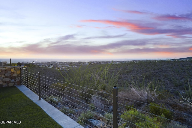 5905 Ojo De Agua Dr, El Paso, TX 79912 - view of balcony at dusk